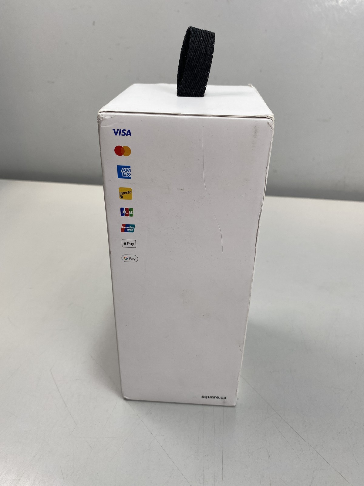 Square Handheld pocketable POS, with built-in payments, barcode scanner,camera.