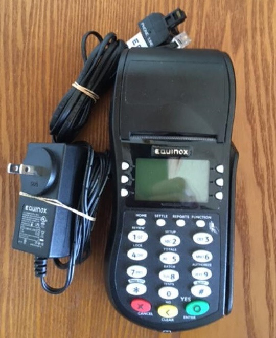 Equinox Model T4205 Credit Card Processing Terminal, lightly used with roll