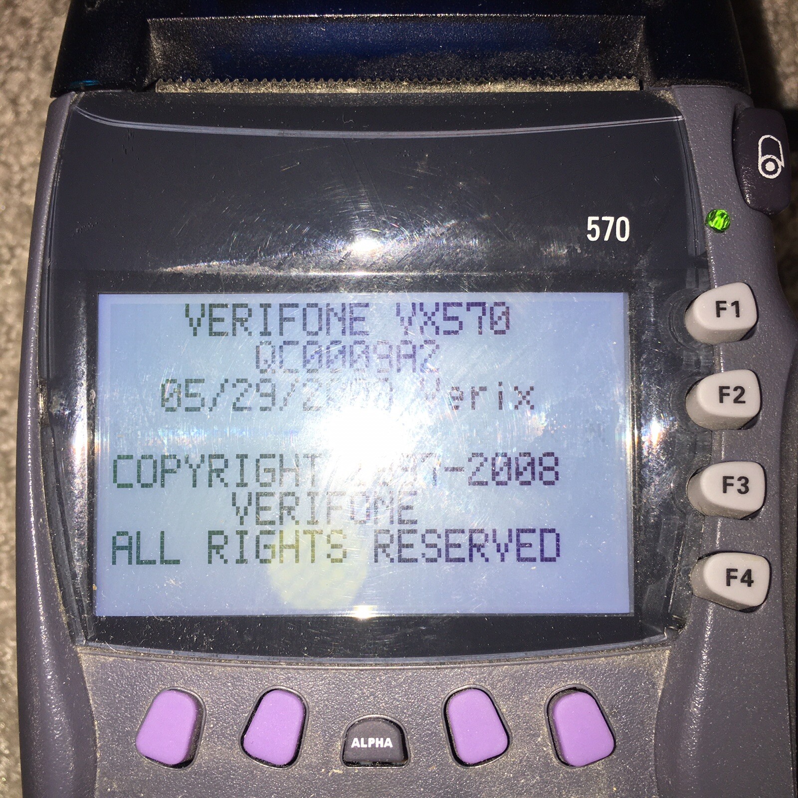 VeriFone VX570 Credit Card Terminal For Repair – Powers On. Rova P/S included.