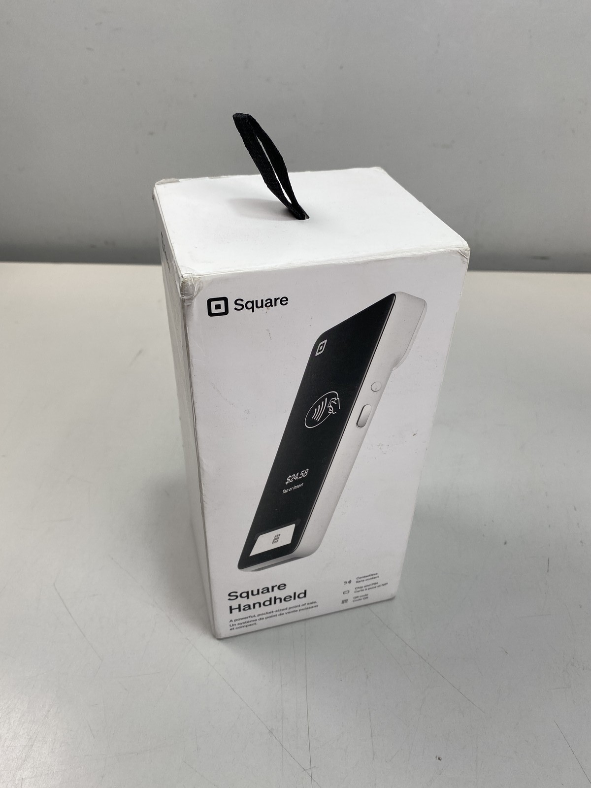 Square Handheld pocketable POS, with built-in payments, barcode scanner,camera.
