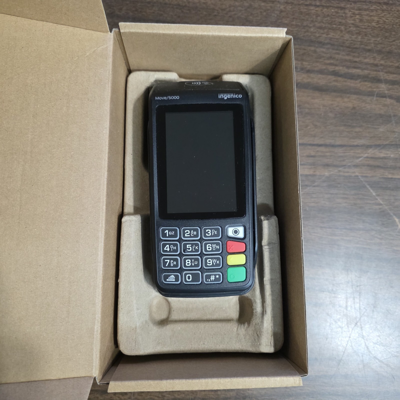 Ingenico Move/5000 Card Reader Terminal with charger. Batteries hold charge