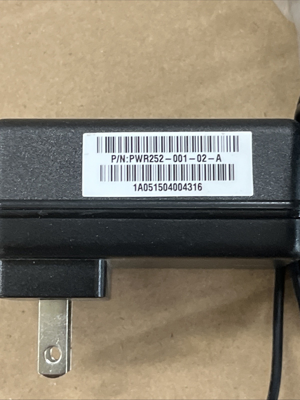Verifone VX520 with either net cable and power cord.