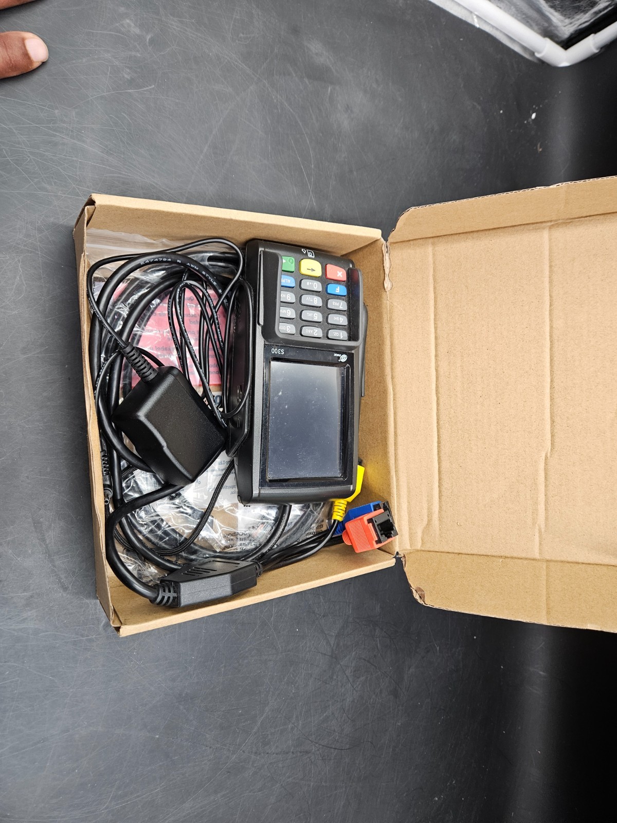 Pax S300 pin pad connected and powered on