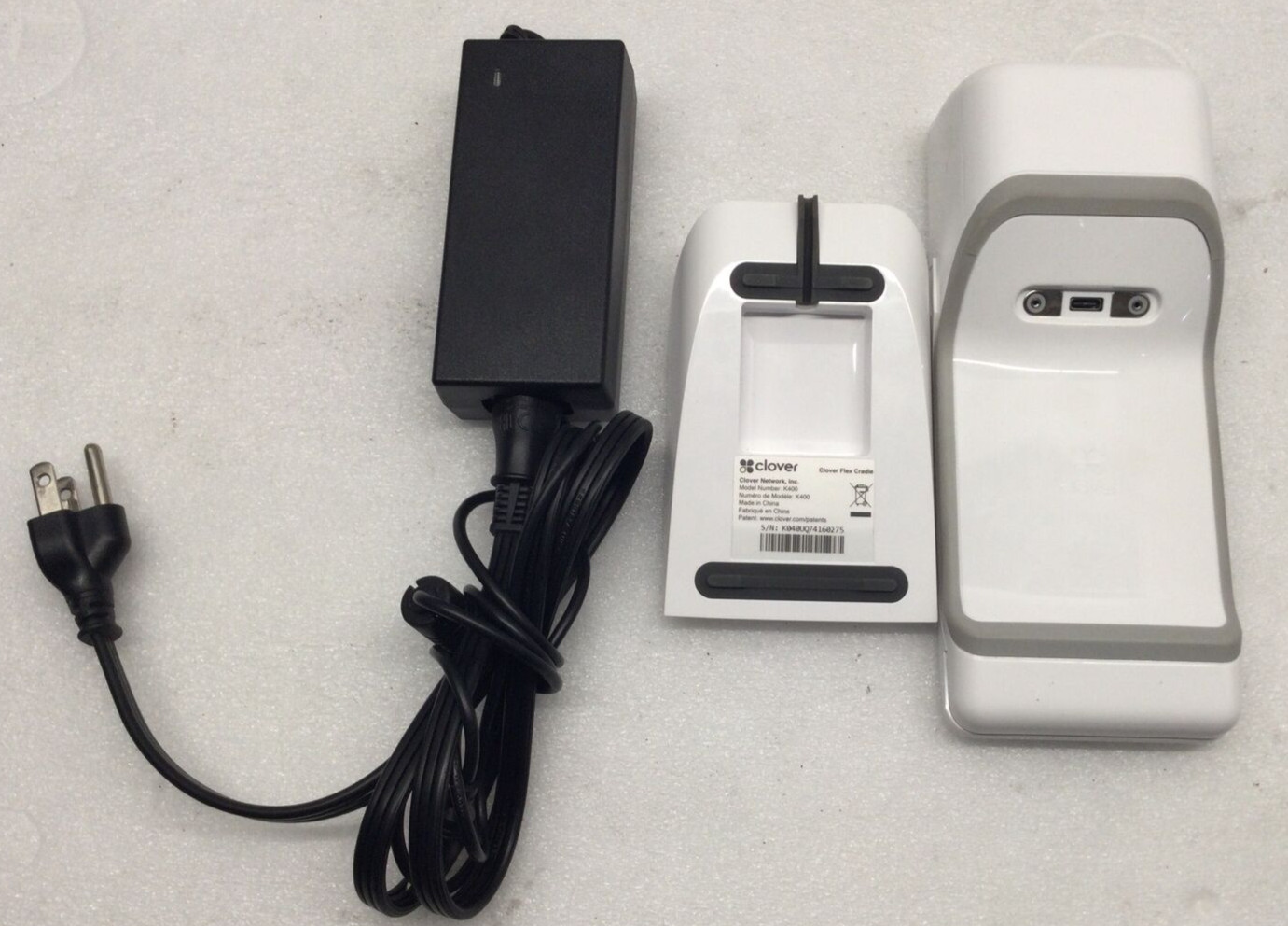 Clover Flex LTE C401U Wireless Credit Card Processor With Charging Cradle.