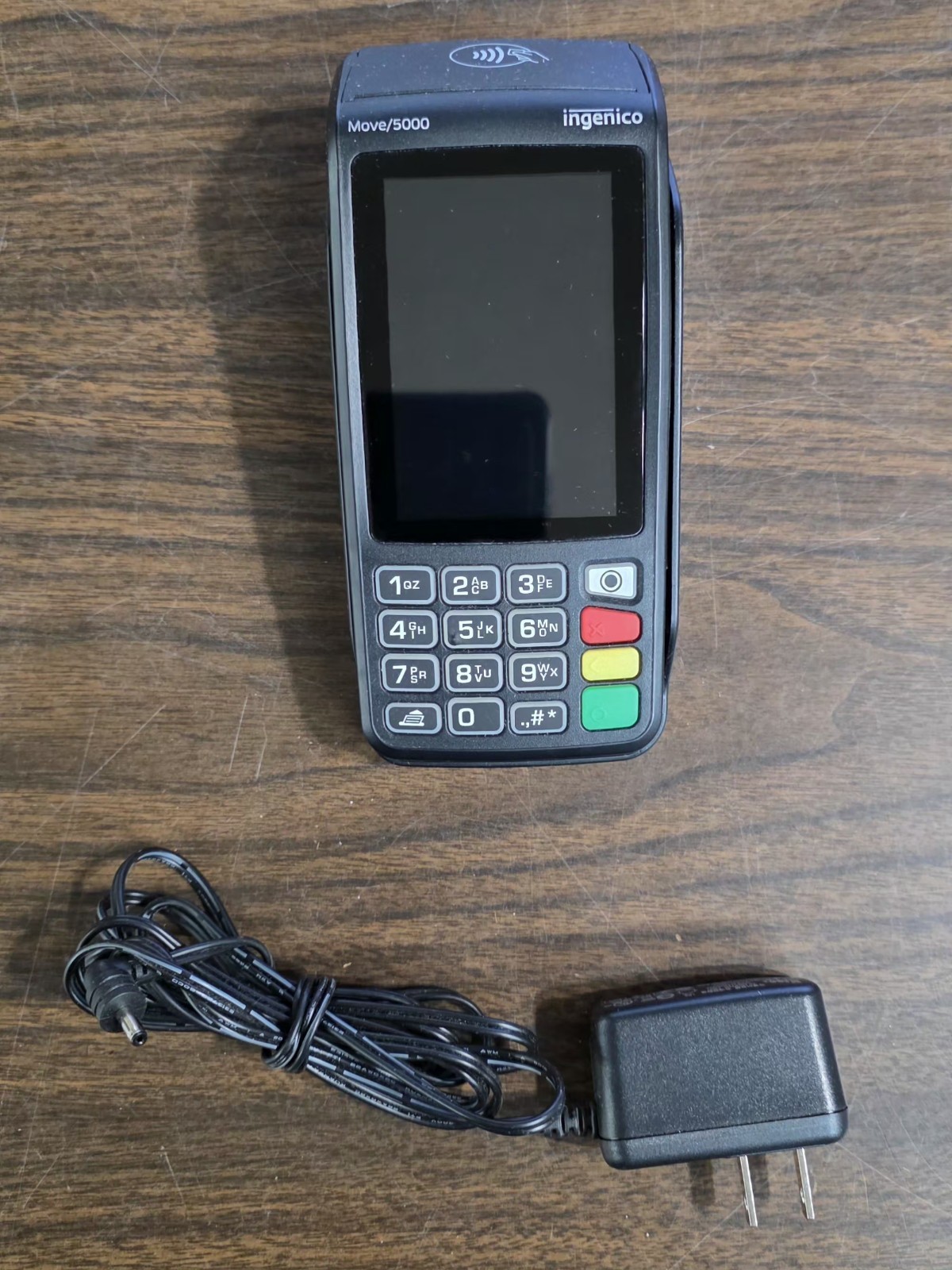 Ingenico Move/5000 Card Reader Terminal with charger. Batteries hold charge