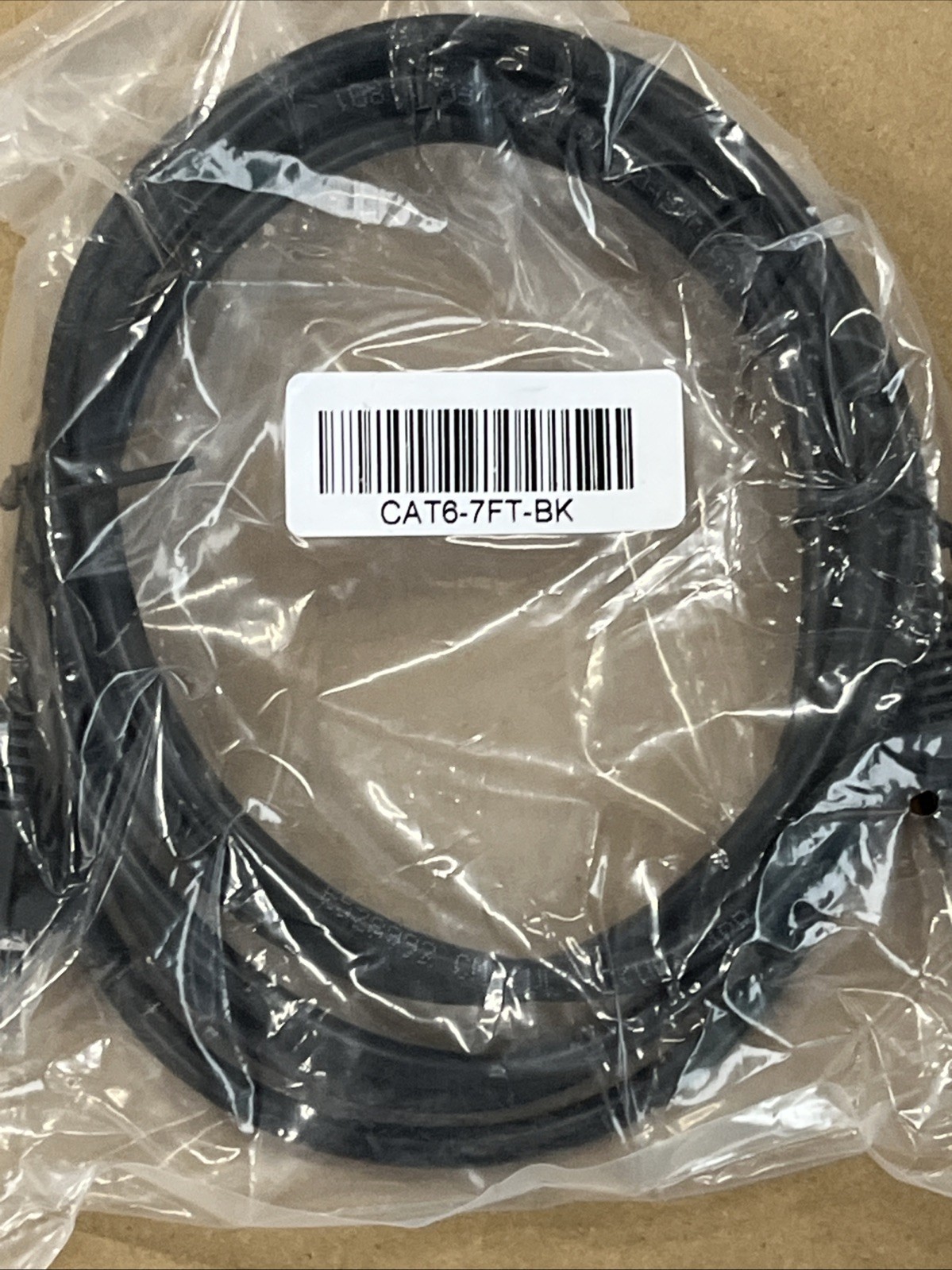 Verifone VX520 with either net cable and power cord.