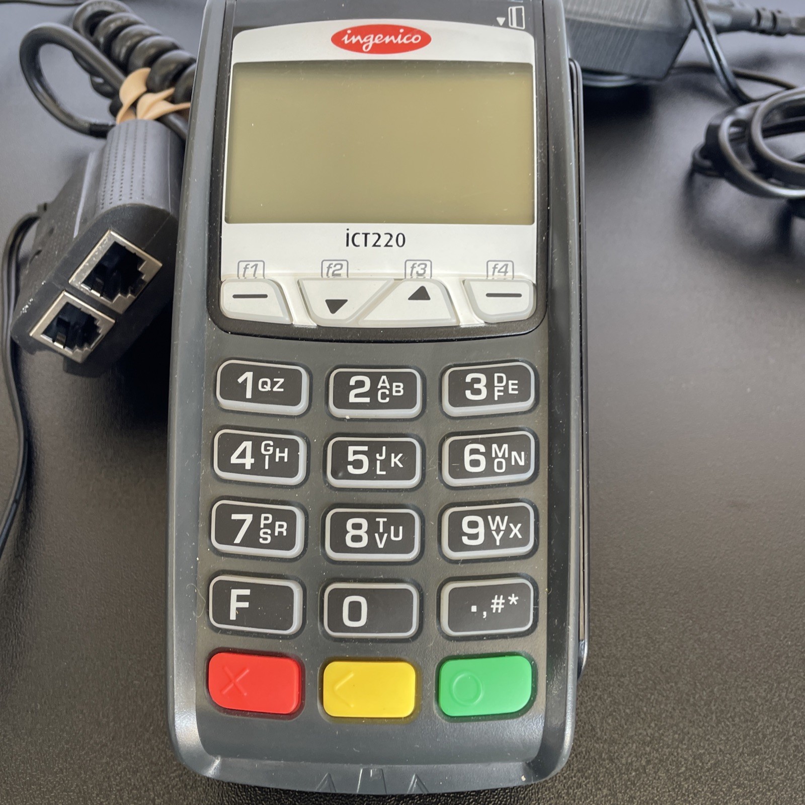 Ingenico iCT220 Credit Card Terminal w/ electronic plug and phone adapter