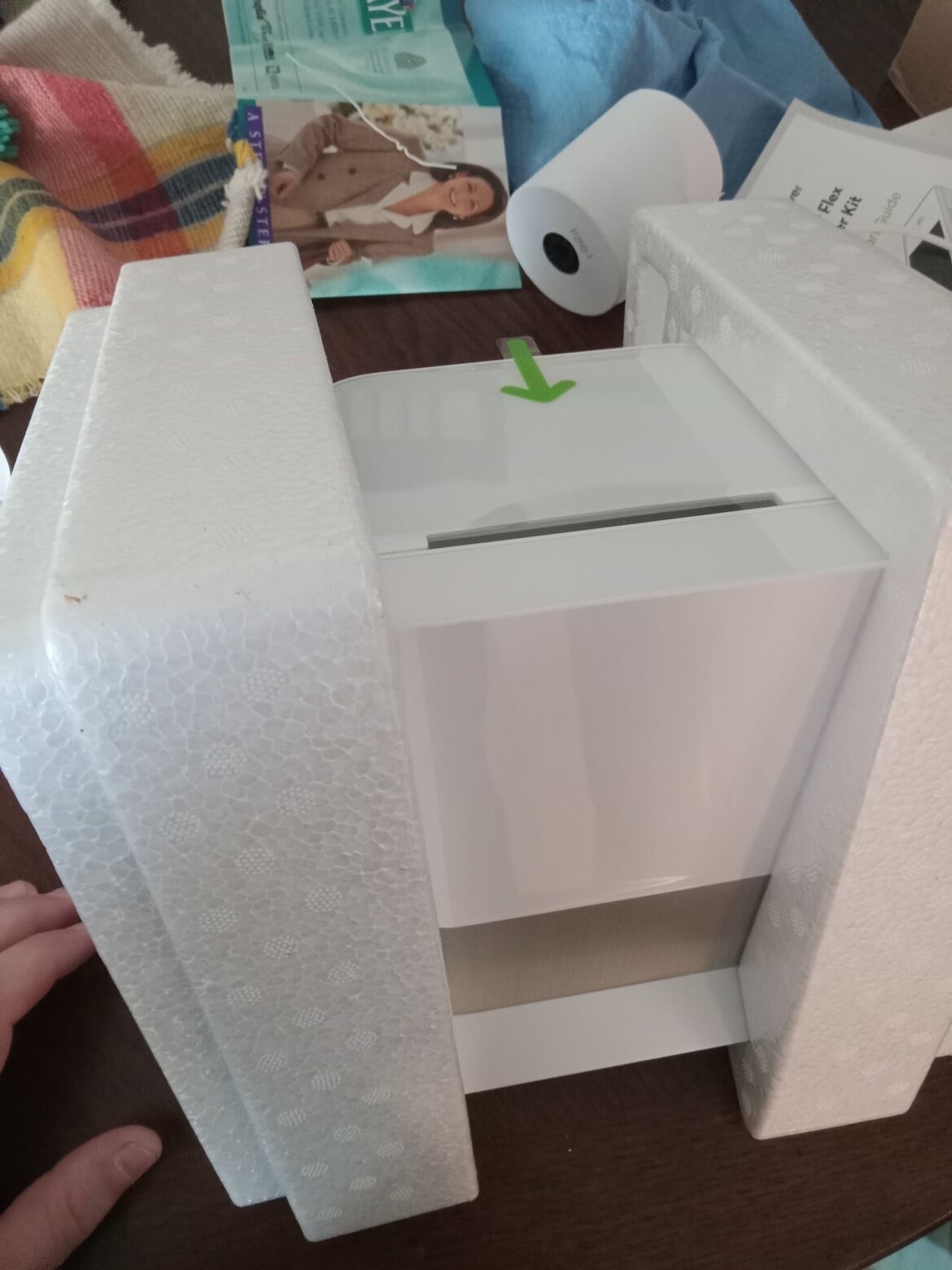 Clover Station C500 POS System with receipt printer and roll of receipt paper