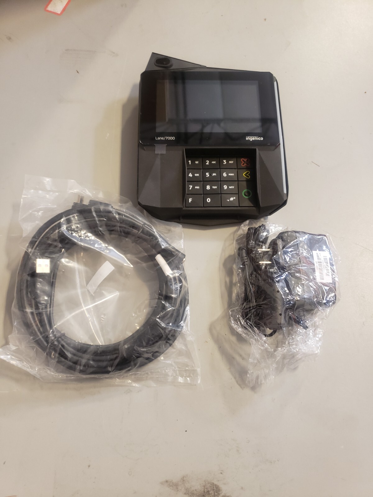 Ingenico Lane 7000 w/ camera, USB cable and external power supply – Lot of 100