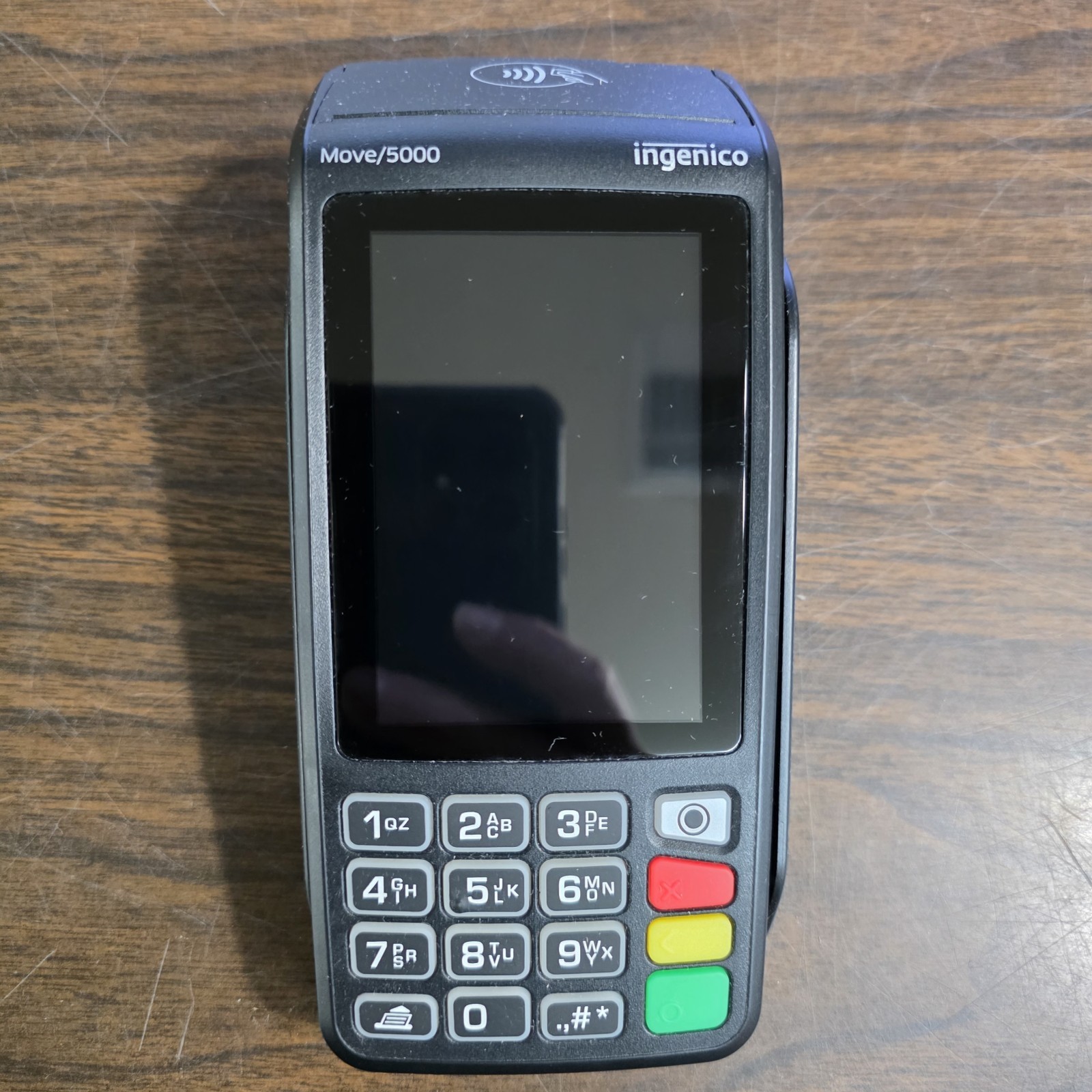 Ingenico Move/5000 Card Reader Terminal with charger. Batteries hold charge