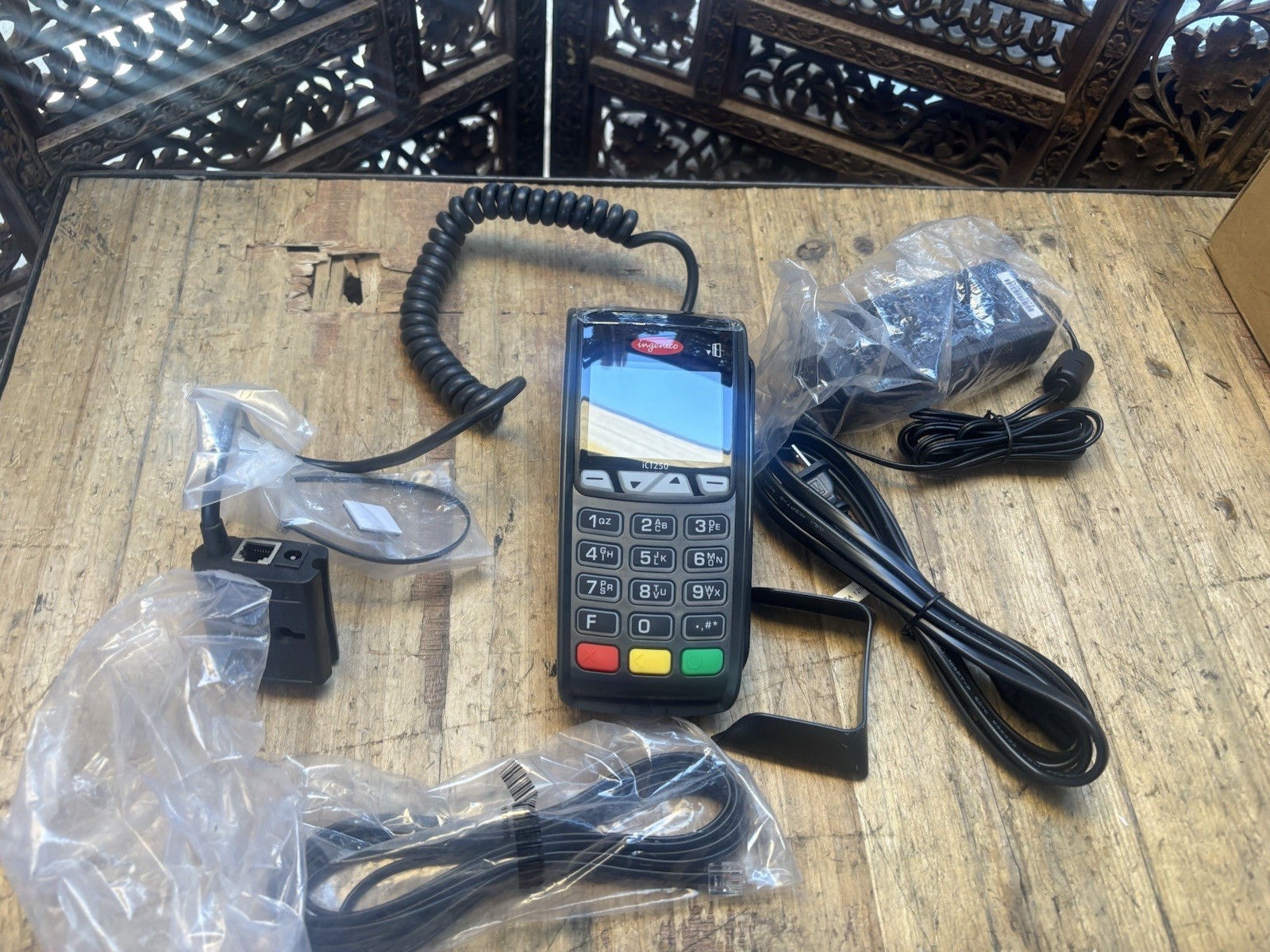 The Ingenico iCT250 is a compact, countertop payment termina