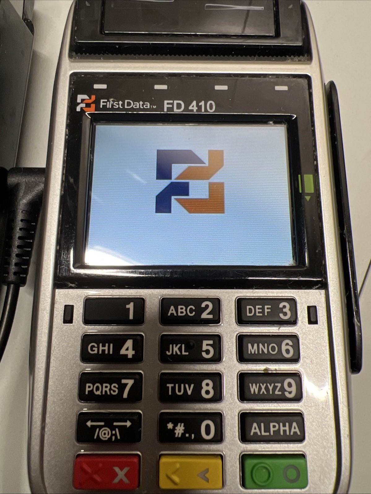 Two First Data FD 410 Wireless Credit Card Terminals – One power adapter