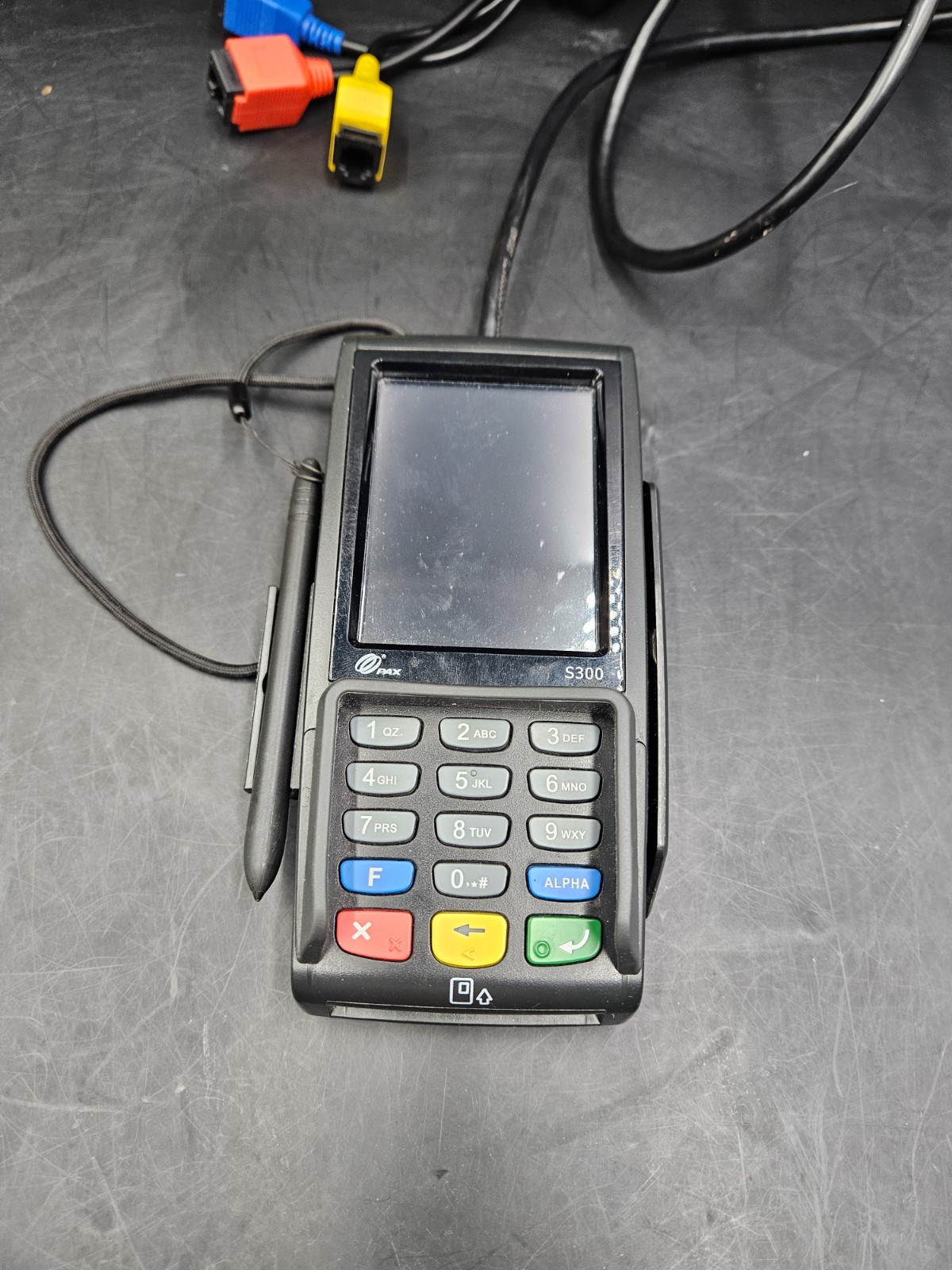 Pax S300 pin pad connected and powered on