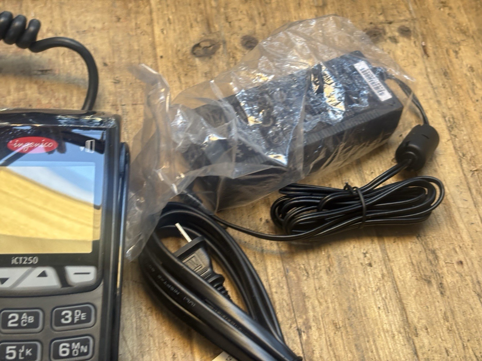 The Ingenico iCT250 is a compact, countertop payment termina
