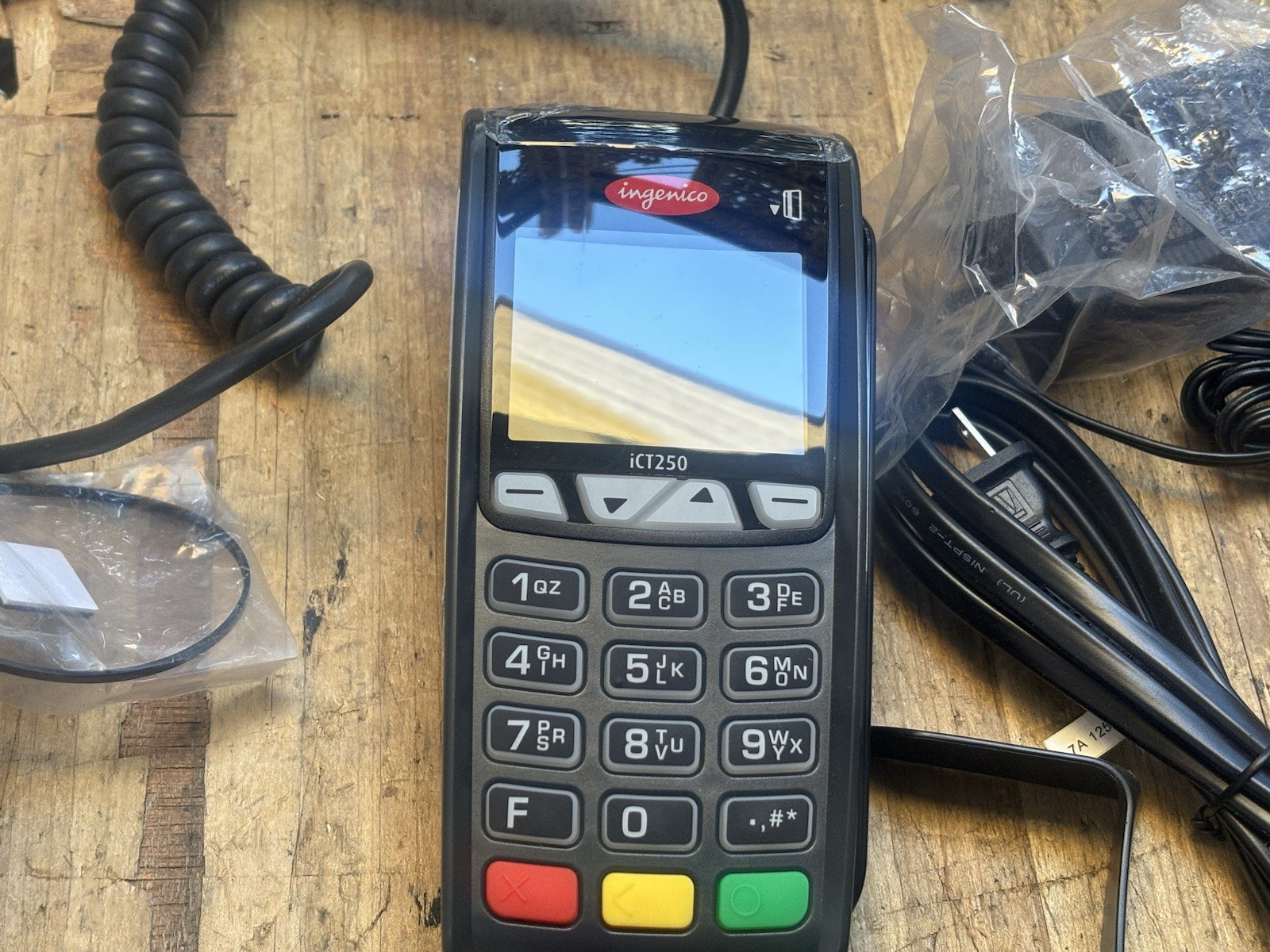 The Ingenico iCT250 is a compact, countertop payment termina