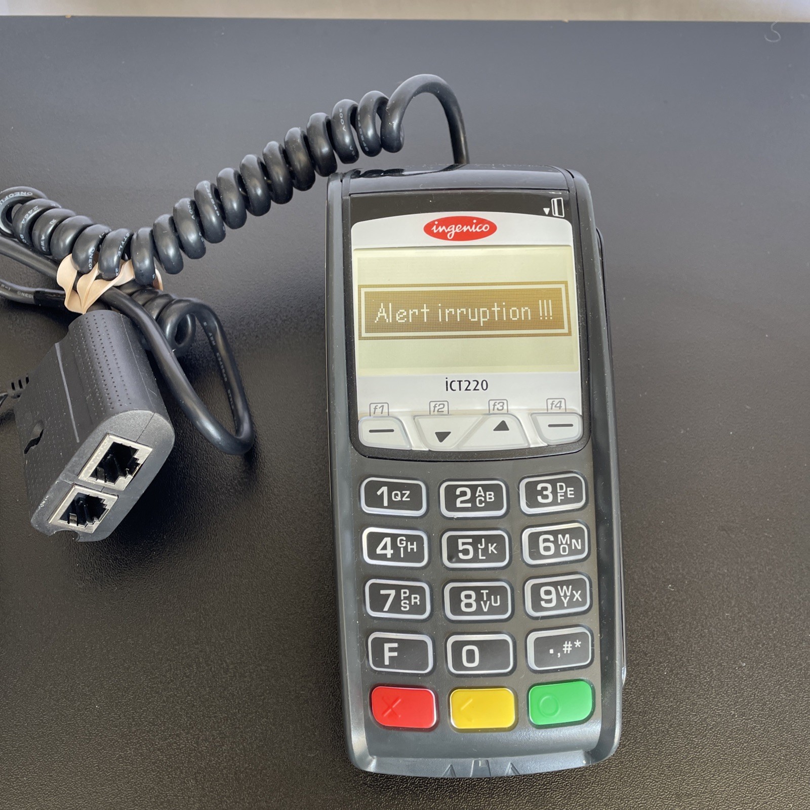 Ingenico iCT220 Credit Card Terminal w/ electronic plug and phone adapter