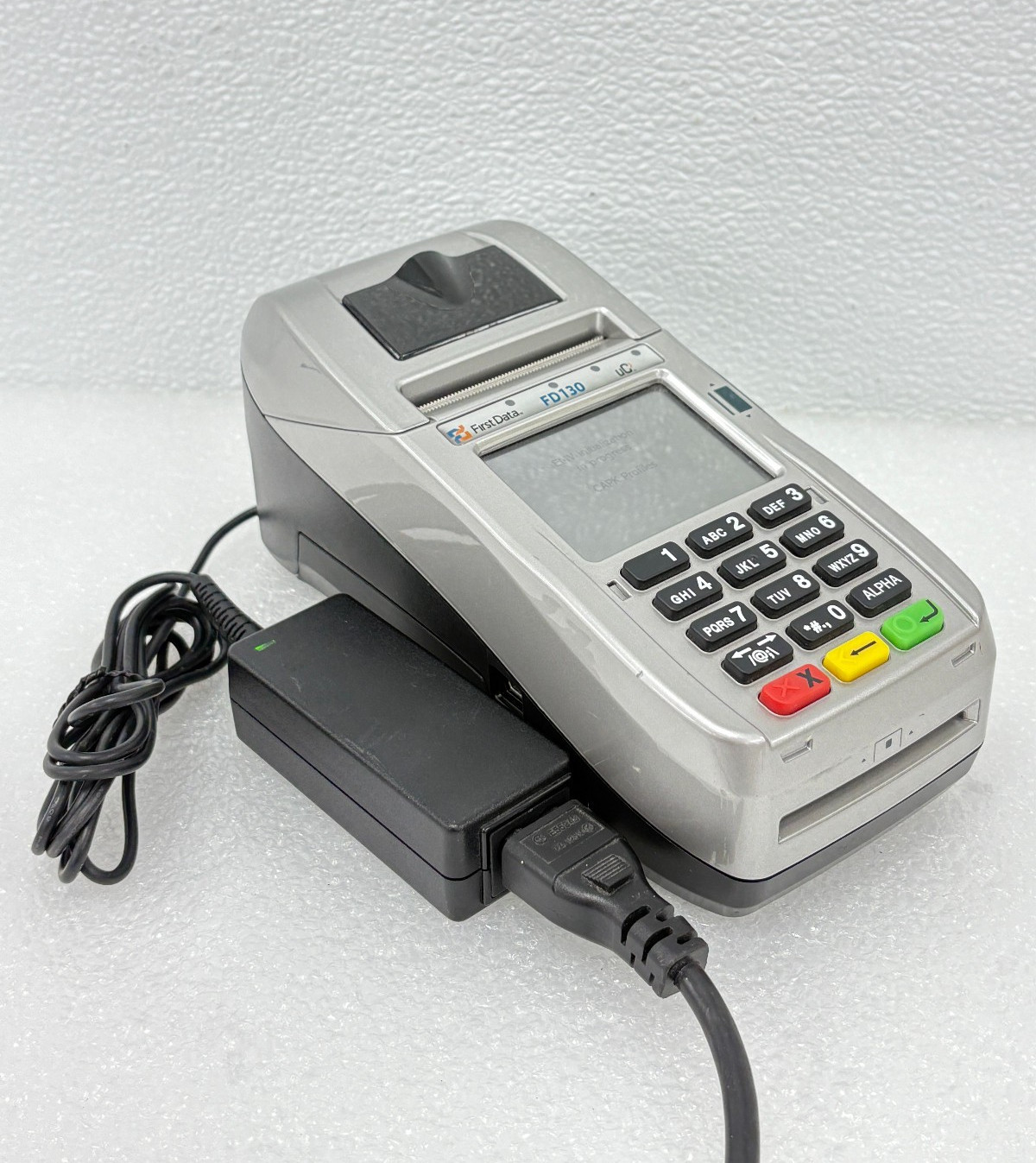 Pre Owned | First Data FD130 POS Credit Card Terminal with Power Adapter -Silver