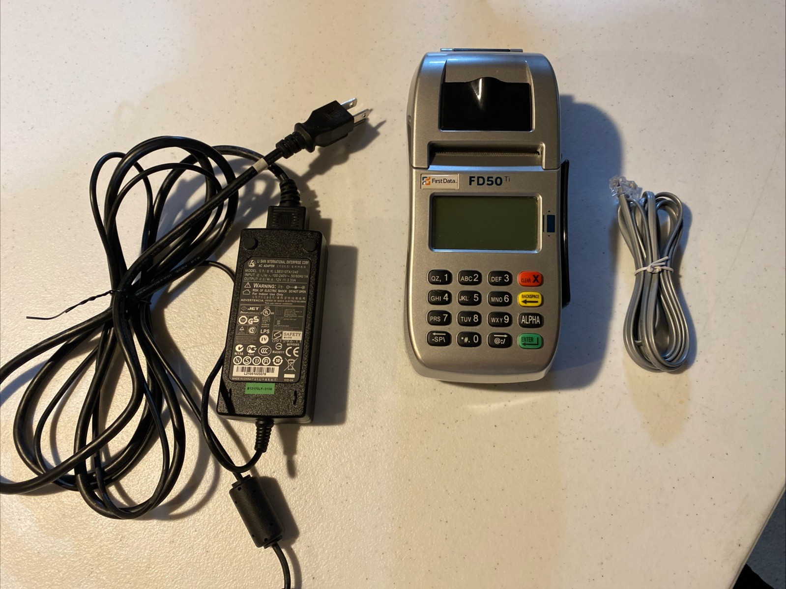 First Data FD50 EMV NFC (Dial/IP) Credit Card Machine With AC Adapter