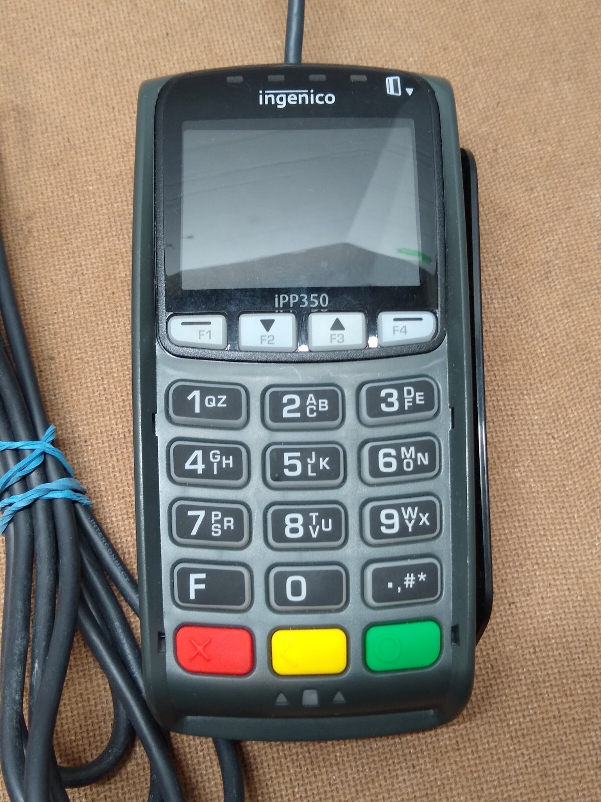 Ingenico Credit Card Payment Terminal IPP350 Powers on
