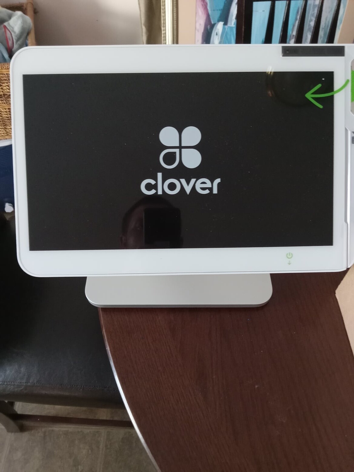 Clover Station C500 POS System with receipt printer and roll of receipt paper