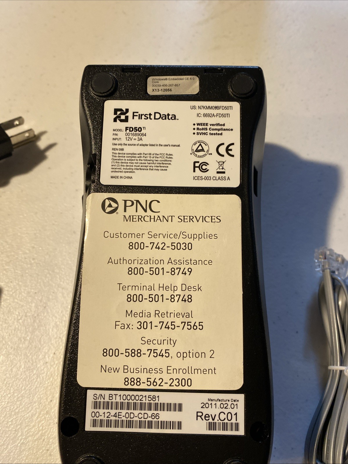 First Data FD50 EMV NFC (Dial/IP) Credit Card Machine With AC Adapter