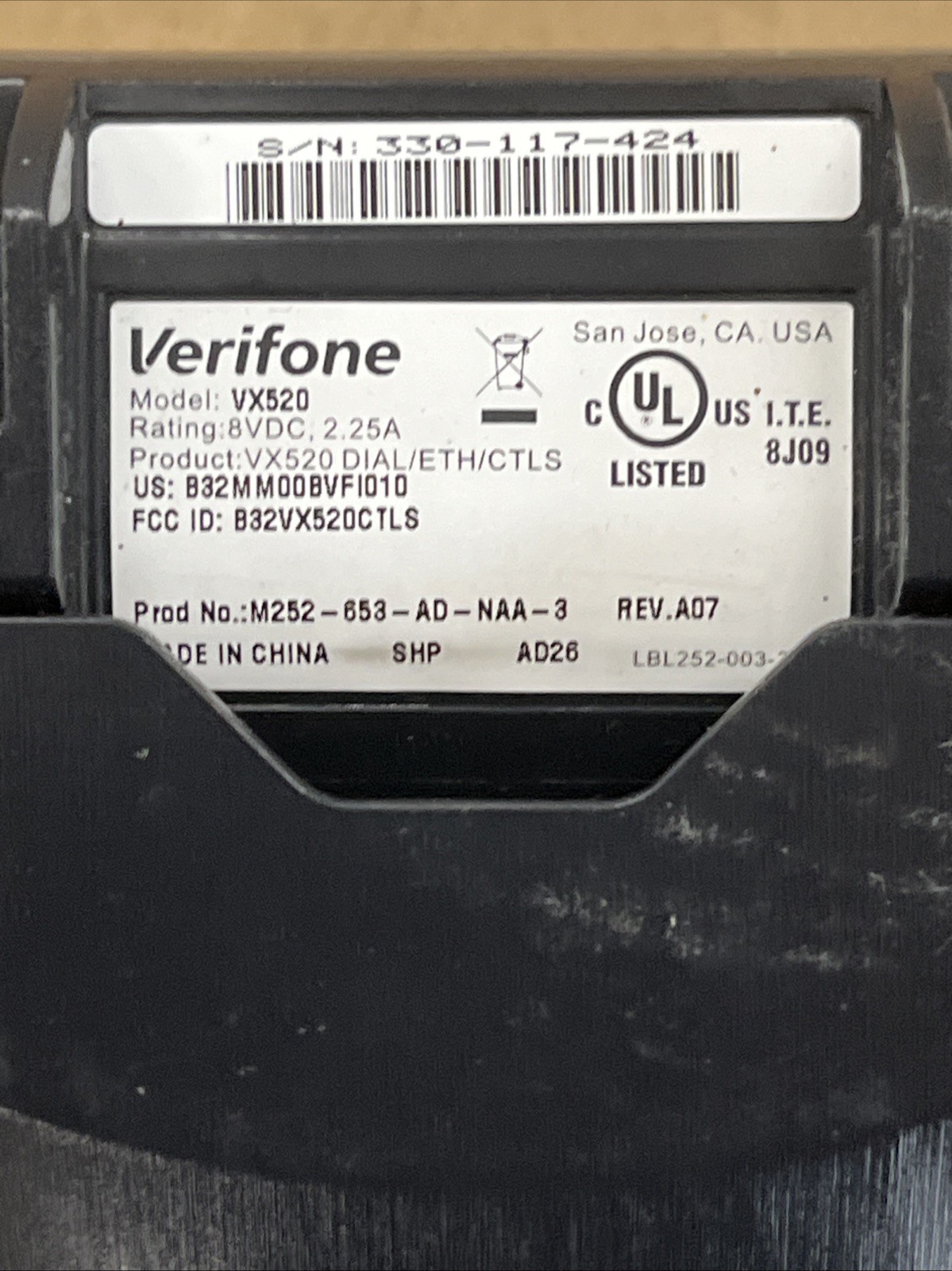 Verifone VX520 with either net cable and power cord.
