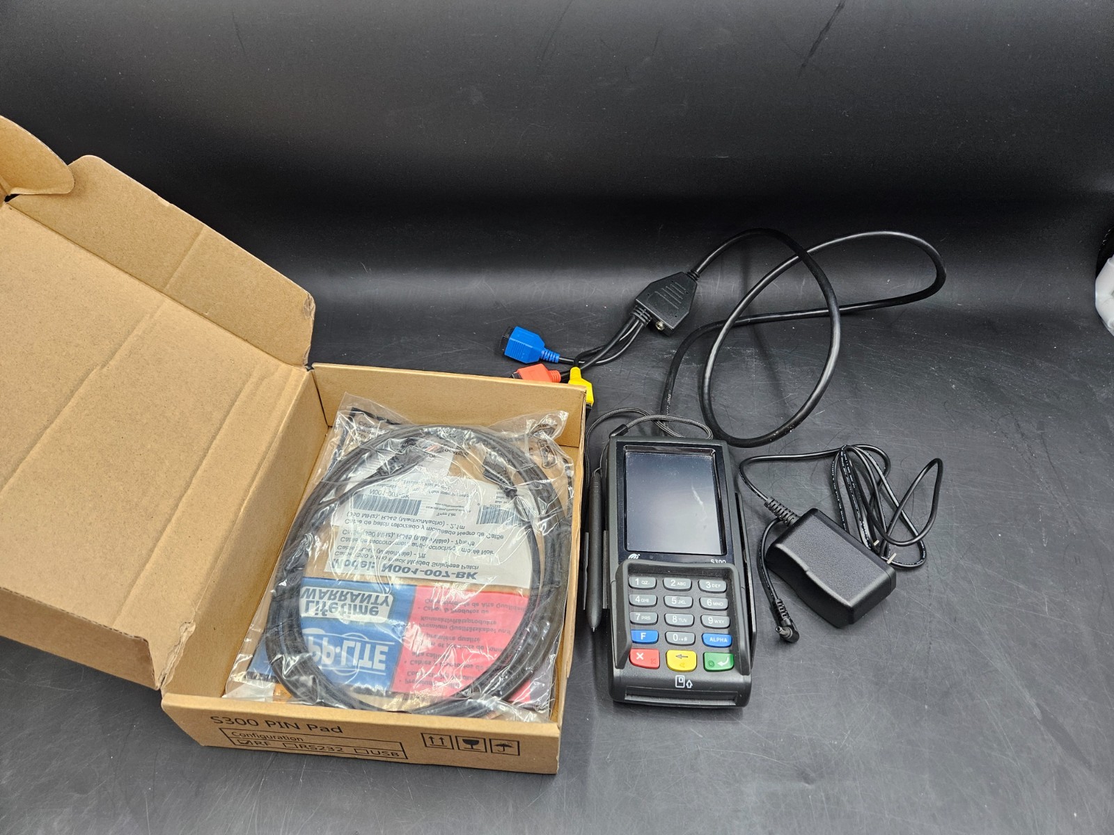 Pax S300 pin pad connected and powered on