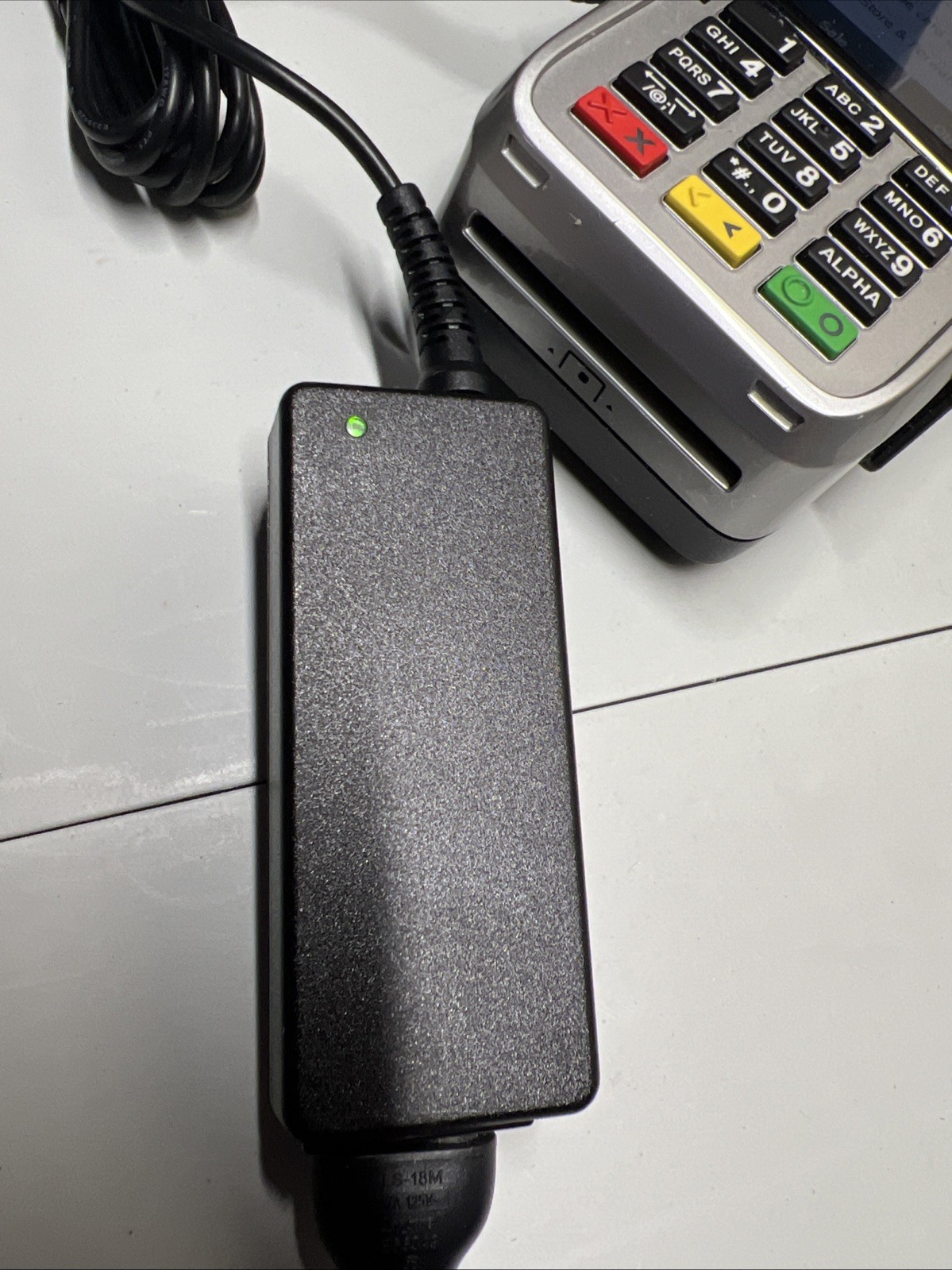 Two First Data FD 410 Wireless Credit Card Terminals – One power adapter