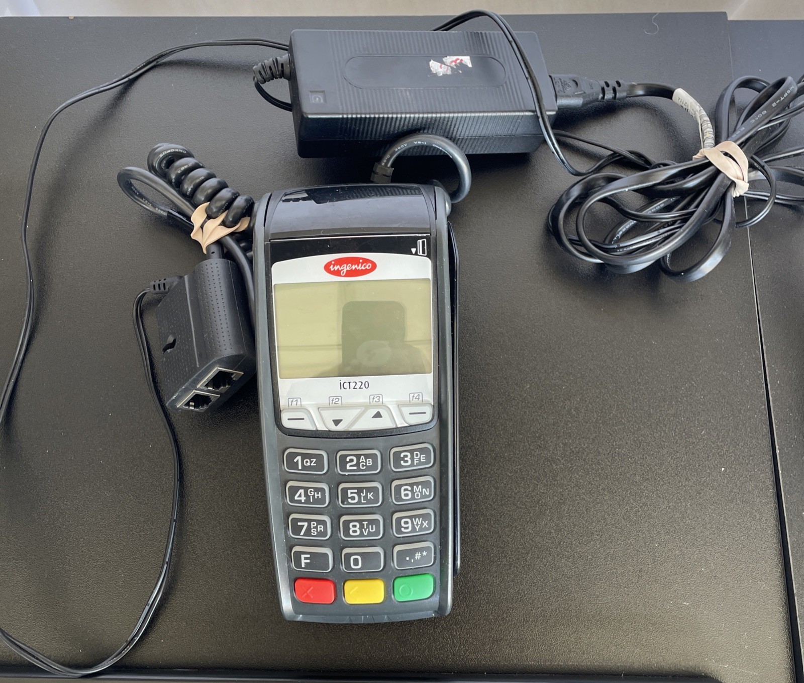 Ingenico iCT220 Credit Card Terminal w/ electronic plug and phone adapter