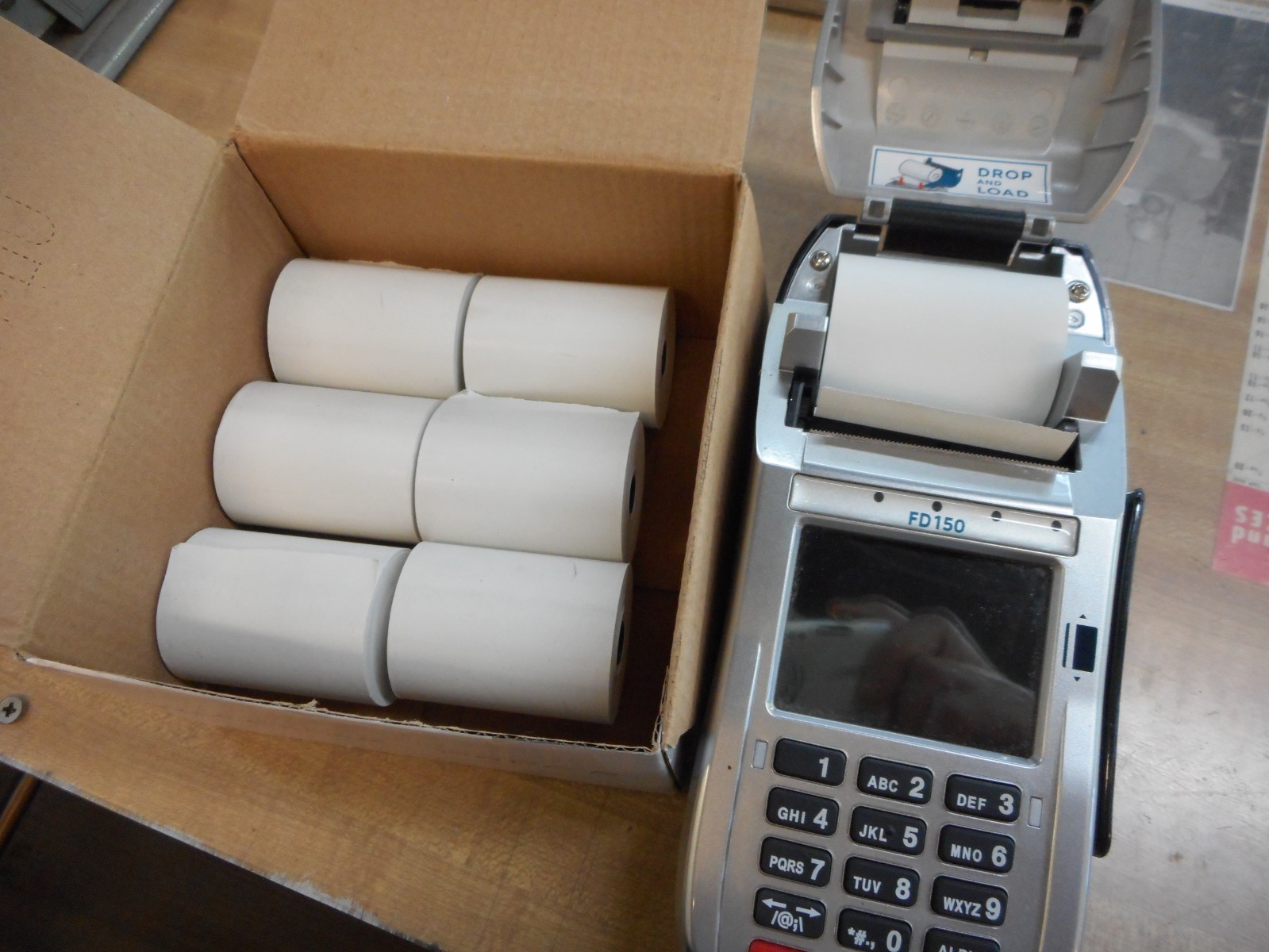 First Data FD150 EMV CTLS Credit Card Terminal with 6 Extra Rolls of Paper